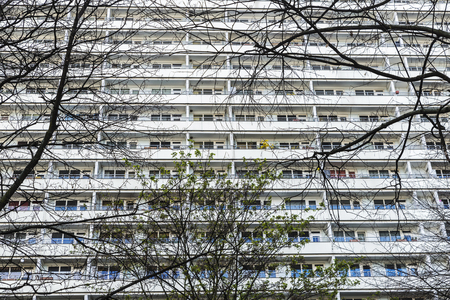 Facade of a modern residential skyscraper full of flats in Berlin, Germanyの写真素材