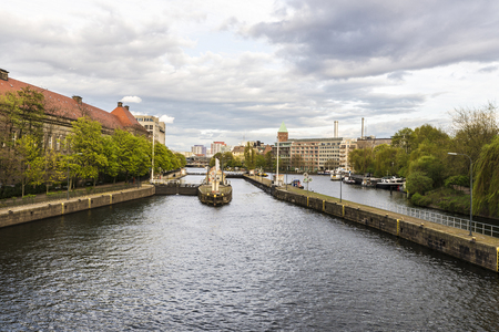 Dikes with sluice gates on the Spree river in Berlin, Germanyの写真素材