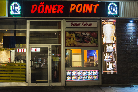 Berlin, Germany - April 14, 2017: Facade of a Doner kebap at night in Berlin, Germanyのeditorial素材