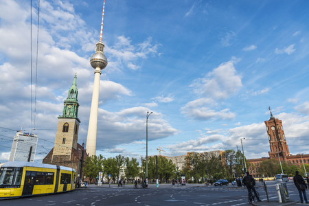 Berlin, Germany - April 13, 2017: St Mary church (Marienkirche), town hall and telecommunications tower with people walking in Alexanderplatz square in Berlin, Germanyのeditorial素材
