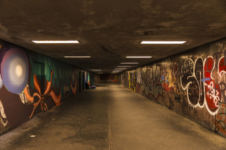 Berlin, Germany - April 14, 2017: Tunnel illuminated for the passage of people in Berlin, Germanyのeditorial素材