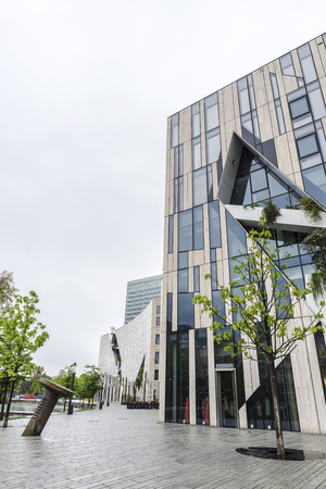 Street with modern buildings near a park in Dusseldorf, Germanyのeditorial素材