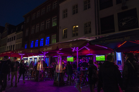 Dusseldorf, Germany - April 16, 2017: People enjoy music bars and restaurants at night in Altstadt of Dusseldorf, Germanyのeditorial素材