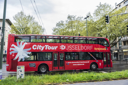 Dusseldorf, Germany - April 16, 2017: Tour bus in the center of Dusseldorf, Germanyのeditorial素材