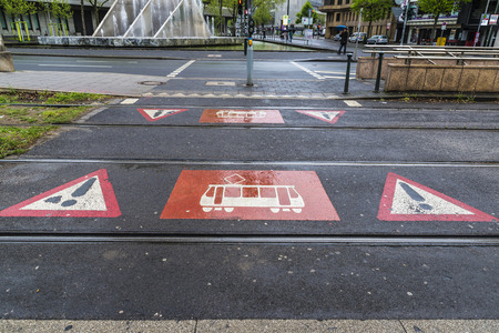 Dusseldorf, Germany - April 16, 2017: Warning sign of passage of a tram on street in Dusseldorf, Germanyのeditorial素材