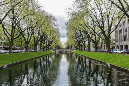 Dusseldorf, Germany - April 16, 2017: River in Konigsallee street with a duck in Dusseldorf, Germanyのeditorial素材