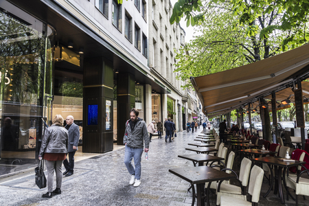 Dusseldorf, Germany - April 16, 2017: Konigsallee shopping street with people walking in Dusseldorf, Germanyのeditorial素材
