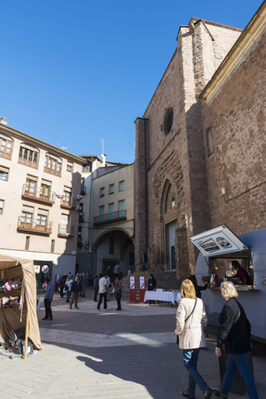 Cardona, Spain - October 30, 2016: Flea market with customers and sellers in the old town of Cardona, Catalonia, Spainのeditorial素材