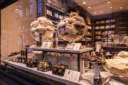 Brussels, Belgium - August 26, 2017: Assortment of traditional belgian chocolate in the shop window of a candy shop in Brussels, Belgiumのeditorial素材