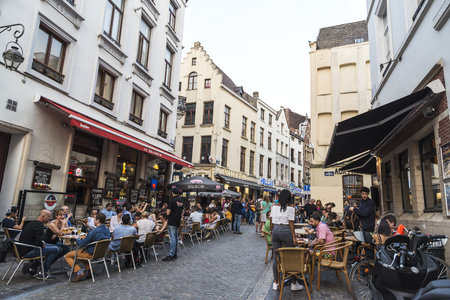 Brussels, Belgium - August 26, 2017: People in a bar having a drink and walking on a street in Brussels, Belgiumのeditorial素材