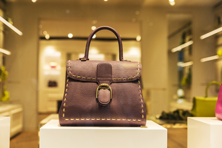 Brussels, Belgium - August 26, 2017: Brown leather purse Delvaux store in the Galeries Royales Saint Hubert in Brussels, Belgiumのeditorial素材