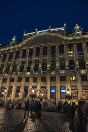 Brussels, Belgium - August 26, 2017: Mansion of the Dukes of Brabant at the Grand Place with people walking around at night in Brussels, Belgiumのeditorial素材