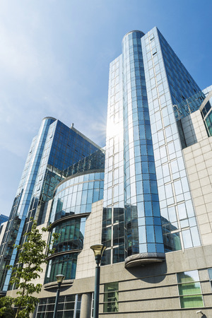 Facade of the modern office buildings of the European Parliament in Brussels, Belgiumの写真素材