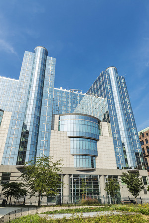 Facade of the modern office buildings of the European Parliament in Brussels, Belgiumの写真素材