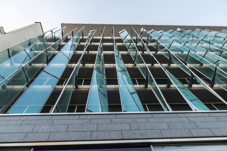 Facade of a modern office building as background in Brussels, Belgiumの写真素材