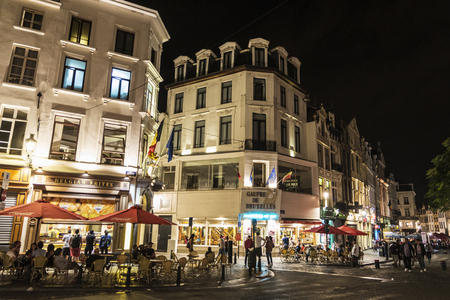 Brussels, Belgium - August 27, 2017: Street full of bars and restaurants with people walking at night located in the historic center of Brussels, Belgiumのeditorial素材