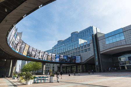 Brussels, Belgium - August 28, 2017: Facade of the modern office buildings of the European Parliament and station Europe with people around in Brussels, Belgiumのeditorial素材