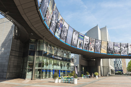 Brussels, Belgium - August 28, 2017: Facade of the modern office buildings of the European Parliament and station Europe with people around in Brussels, Belgiumのeditorial素材