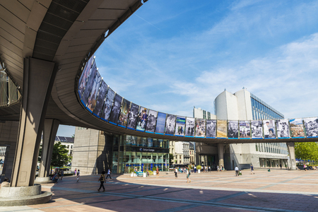 Brussels, Belgium - August 28, 2017: Facade of the modern office buildings of the European Parliament and station Europe with people around in Brussels, Belgiumのeditorial素材