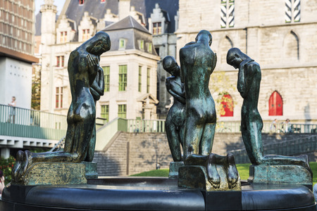 Ghent, Belgium - August 28, 2017: Fountain of bronze sculpture called Kneeling boys in the medieval city of Ghent in Belgiumのeditorial素材