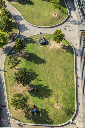Top view of people resting in a public park in Ghent, Belgiumの写真素材