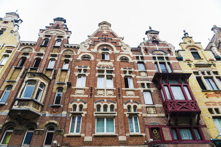 Facade of an old historic buildings of the medieval village of Ghent, Belgiumの写真素材