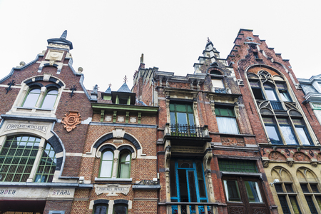 Facade of an old historic buildings of the medieval village of Ghent, Belgiumのeditorial素材