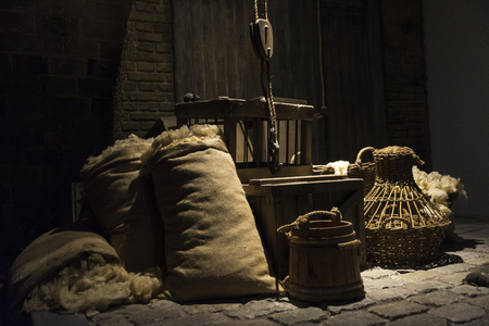 Groceries in sacks and baskets in a medieval warehouse in Europeの写真素材