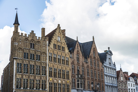 Bruges, Belgium, - August 31, 2017: Facade of old historic buildings in the medieval city of Bruges, Belgiumのeditorial素材