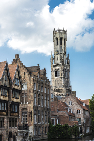 Bruges, Belgium, - August 31, 2017: Belfort seen from Rozenhoedkaai or Rosary Dock with people around in the medieval city of Bruges, Belgiumのeditorial素材