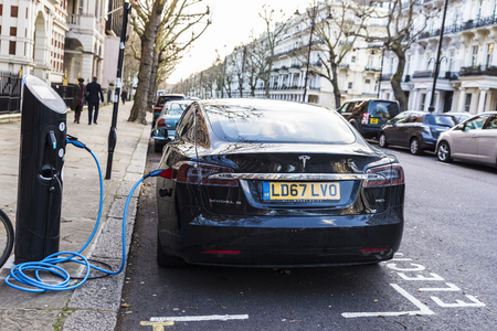 London, Great Britain  - January 3, 2018: Electric car Tesla Model S recharging the batteries on a street in London, Great Britainのeditorial素材