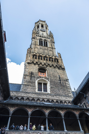 Bruges, Belgium, - August 31, 2017: Belfry is a medieval bell tower in the historic center of Bruges, Belgium with people aroundのeditorial素材