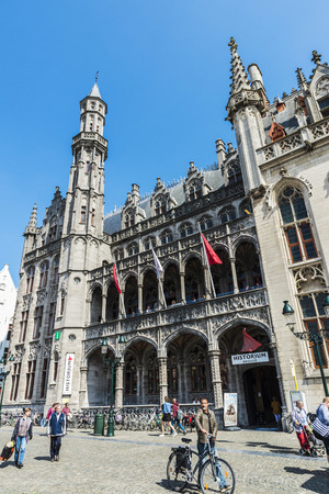 Bruges, Belgium - August 31, 2017: Facade of the Historium Brugge, a museum dedicated to the history of the medieval city of Bruges with people around in Belgiumのeditorial素材