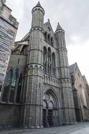 Facade of Saint-Salvator Cathedral (Sint Salvatorskathedraal) in the historic center of the medieval city of Bruges, Belgiumの写真素材