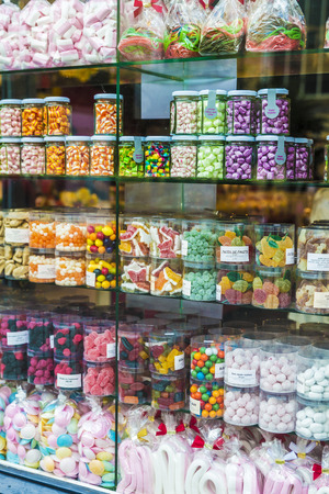 Bruges, Belgium - September 1, 2017: Display of a candy shop full of sugar candies with fruit flavors in the medieval city of Bruges, Belgiumのeditorial素材