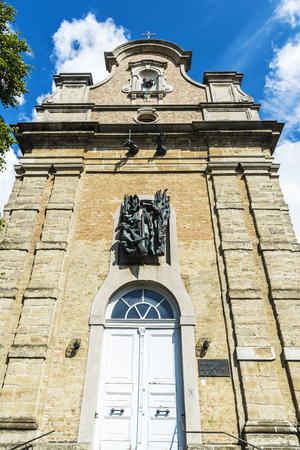 Facade of an old church restored in a concert hall and named after the composer of Bruges Joseph Ryelandt in the medieval city of Bruges, Belgiumの写真素材