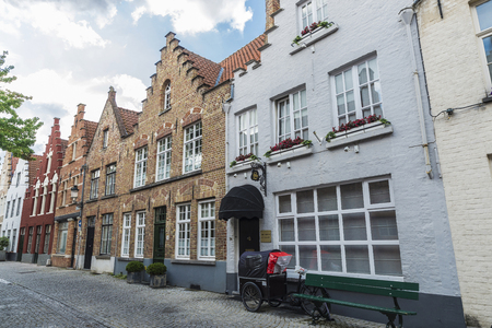 Bruges, Belgium - September 1, 2017: Street with old houses in the old historic center of the medieval city of Bruges, Belgiumのeditorial素材