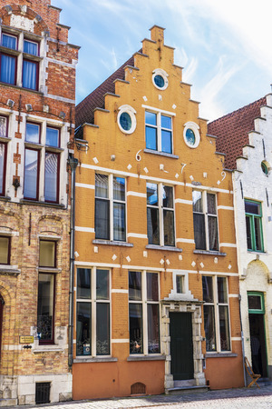 Bruges, Belgium - September 1, 2017: Facade of old historic buildings in the medieval city of Bruges, Belgiumのeditorial素材