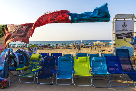 Castellammare del Golfo, Italy - August 6, 2017: Objects of all kinds in a souvenir shop highlighting hammocks in a flea market on a beach of Castellammare del Golfo in Sicily, Italyのeditorial素材