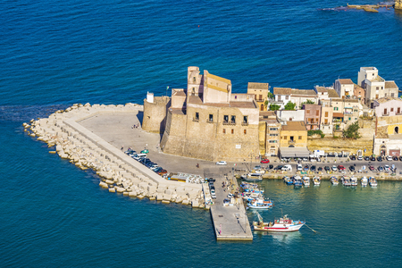 Overview of Castellammare del Golfo with its marina and its medieval fortress in summer in Sicily, Italyのeditorial素材