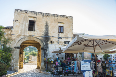 Scopello, Italy - August 7, 2017: Street in the old town with a souvenir shop in Scopello in Sicily, Italyのeditorial素材