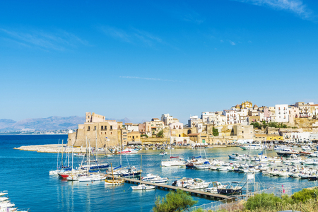 Castellammare del Golfo, Italy - August 7, 2017: Overview of Castellammare del Golfo with its marina and its medieval fortress in summer in Sicily, Italyのeditorial素材