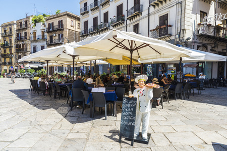 Palermo, Italy - August 10, 2017: Terrace of a restaurant bar with people around in the old town of Palermo in Sicily, Italyのeditorial素材