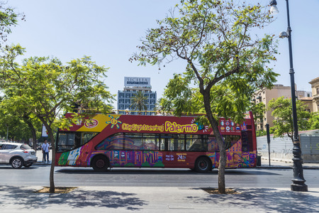 Palermo, Italy - August 10, 2017: Tour bus with tourists circulating on a street  in Palermo in Sicily, Italyのeditorial素材
