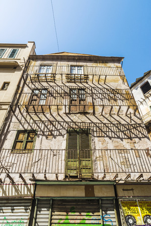 Palermo, Italy - August 10, 2017: Facade of an old and abandoned building in the old town of Palermo in Sicily, Italyのeditorial素材