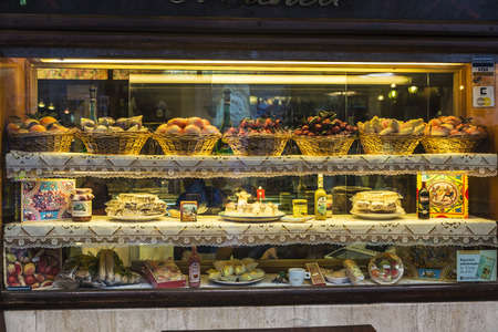 Erice, Italy - August 11, 2017: Assortment of traditional Sicilian sweets in the shop window of a candy shop in the old town of the historic village of Erice in Sicily, Italyのeditorial素材