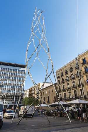 Barcelona, Spain - September 20, 2017: Homenatge als Castellers, it is a conceptual sculpture formed by a stainless steel structure, with people around in the Ghotic quarter of Barcelona, Catalonia, Spainのeditorial素材