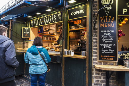 London, England UK  - December 31, 2017: Food stalls in Camden Lock Market or Camden Town with people around in London, England, United Kingdomのeditorial素材