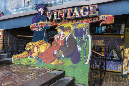 London, England UK  - December 31, 2017: Poster of the vintage fashion shops of Camden Market in Camden Lock or Camden Town in London, England, United Kingdomのeditorial素材