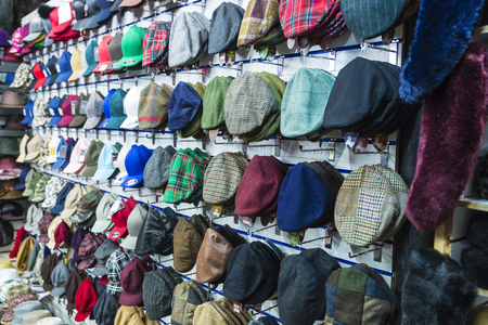 London, United Kingdom - December 31, 2017: Display of a millinery shop with hats, berets and caps in Camden Lock Market or Camden Town in London, England, United Kingdomのeditorial素材